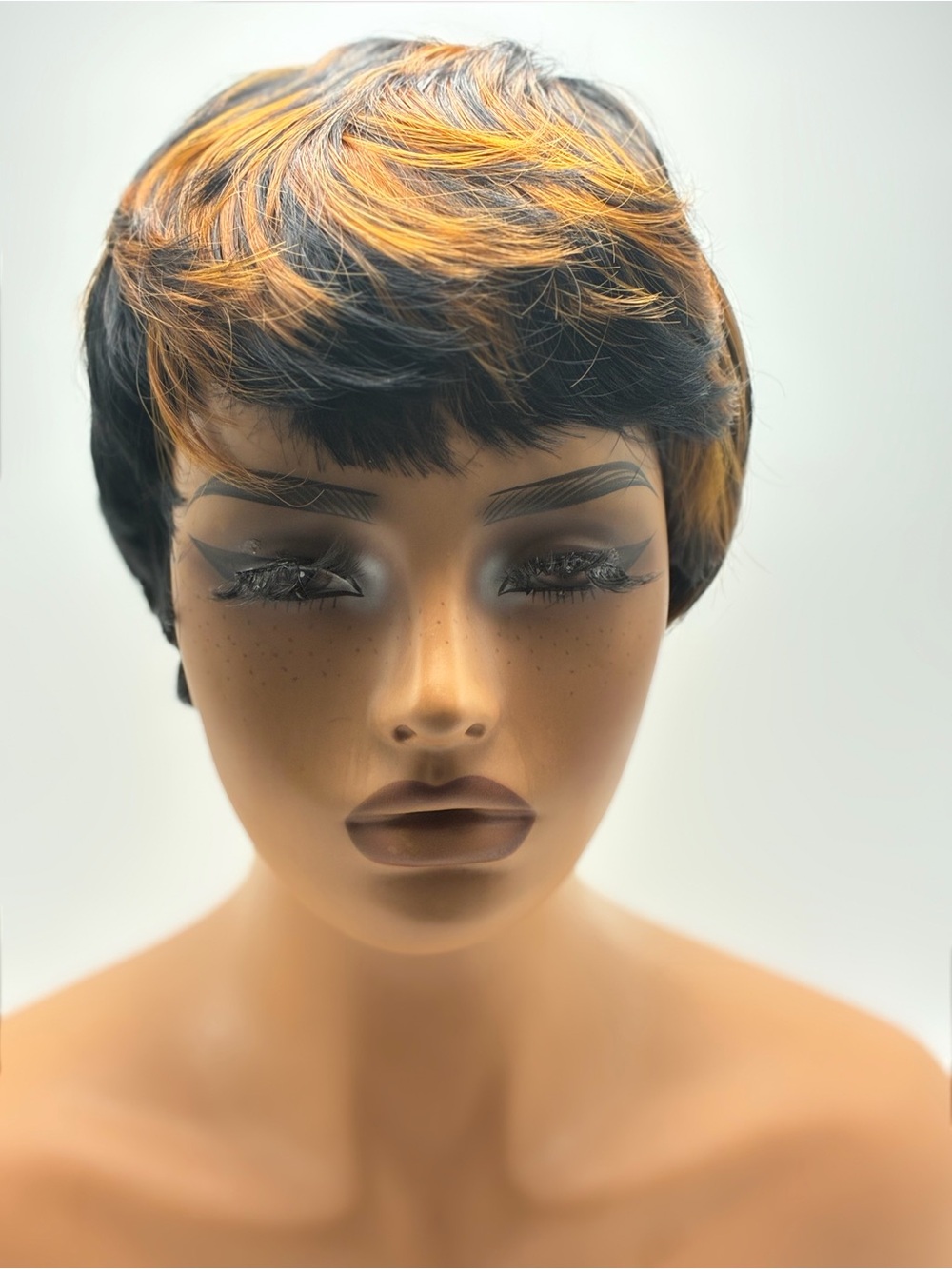 Short Layered Women's Wig with Black and Honey Blonde Highlights. Synthetic